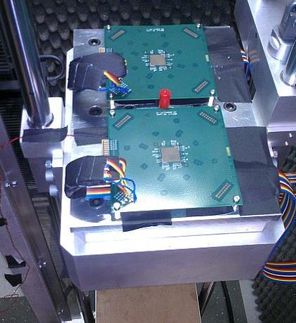 Figure 5.12: Drop test boards mounted to the shock machine, wired for in-situ resistance monitoring. 5.1.2.2 Drop Test Results The sample configurations placed in drop testing is shown in Table 5.