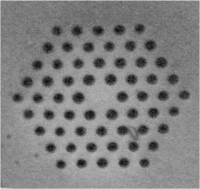 M.A. van Eijkelenborg et al. / Optical Fiber Technology 9 (2003) 199 209 201 Fig. 1. Example of a single-mode microstructured polymer optical fibre (MPOF) with 1.9 µm diameter air holes spaced at 3.