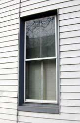 If replacement windows are absolutely necessary, they should match the style and size of the original windows.