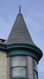 Roofs than cannot be seen from the street need not meet Historic District guidelines.