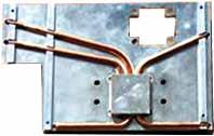 Embedding heat pipes into heat sinks by soldering improves thermal performance compared to the original extruded heat sink shown below.