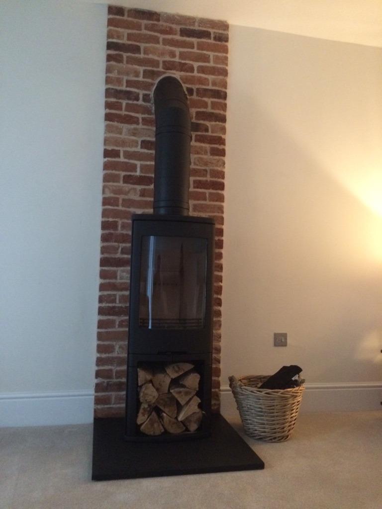 Simplifying Fireplace Chamber Installation Offering the perfect backdrop for a wood burning