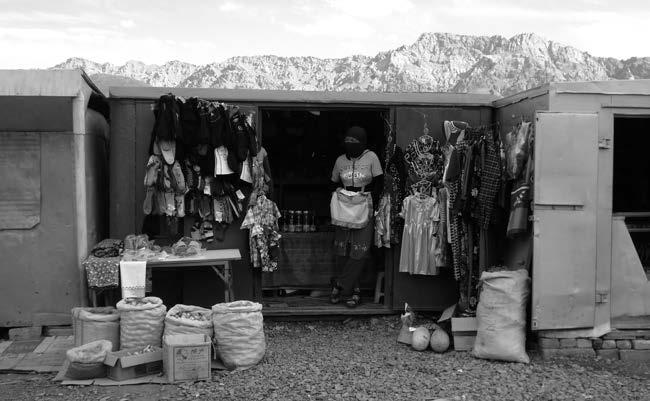 and women offer a limited spectrum of goods at the bazaar in Murghab (Photo 4). Many traders compete against each other due to the low degree of specialisation.