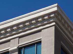 Use materials similar to materials found on roofs, parapets, and cornices on contributing buildings in the district.