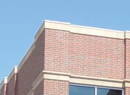 Articulate the center or corners of a parapet in a manner compatible with contributing buildings in the district.