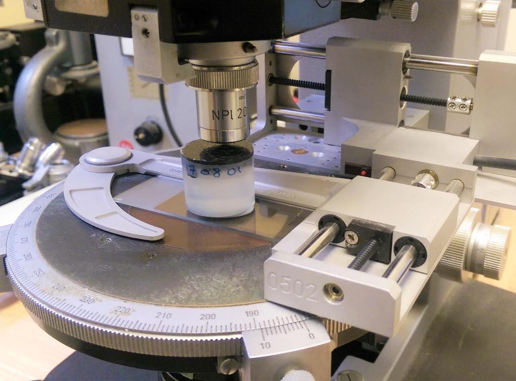 Point counting In point counting, the polished section of clinker is placed on a specialist microscope stage which moves the specimen a predefined distance with a click