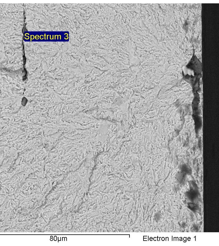The above image illustrates the exact fracture initiation point BSD (back scattered view) at a higher magnification and it can be seen that there is an hard and brittle oxide slag inclusion which