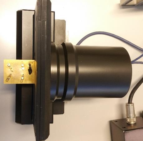 Liquid nitrogen tank Temp sensor Magnet lid Sample board (a) Figure 2.
