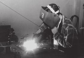 Example three: Safety Appendix III: General Photography Tips and Evaluation Photos: (1- welding without gloves or jacket, 2-getting ready to weld with all