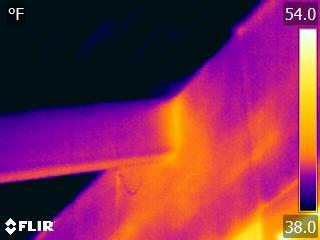 Air leakage can be identified by warm or cold surface areas with thermal tails when viewed up close.
