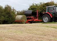 Attis wrappers unload the bales gently back to the ground.