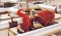 Once the flowing liquid from the centrifugal portion of the pump builds up sufficient pressure in the discharge system, this pressure backs up