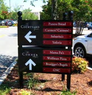 Informational sign means a sign within a business park or commercial subdivision indicating only the name of a particular use and the direction in which it is