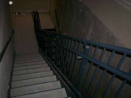 VIEW OF BLACK PAINT ON STAIR COMPONENTS THAT