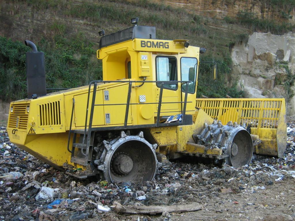 LANDFILL EQUIPMENT BOMAG SHEEP FOOT COMPACTOR with high push power and high compaction density will help lengthen the life of the Fond Cole Sanitary.