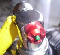 Form No: QF 27 Date: 11 Sept 2014 Rev: 03 TURN ON ratchet knob fully anti-clockwise to the left to OPEN the valve. The green pressure on indicator pin should be raised within the red castellation s.