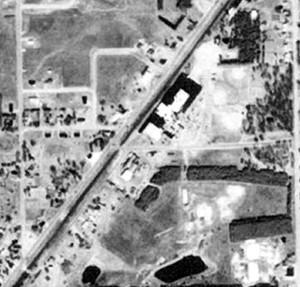 1981 Aerial Photograph USE OF UNTREATED WASTE SEEPAGE LAGOON DISCONTINUED IN 1972 FORMER