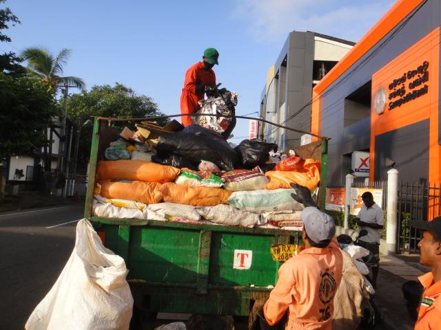Figure 2: Waste collectors at work 2 Such inadequate waste disposal is leading to the emission of methane gas, which not only add to global warming and associated climate change, but also leads to