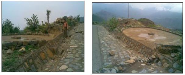 Water harvesting of road runoff, side drains and culvert into small pond, Yemen (REF