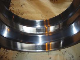 Table 1 Application history of work roll neck bearing failure High-speed rotation, heavy load Rolling fatigue of material Subsurface-initiated flaking Intrusion of rolling mill oil or scale Decrease