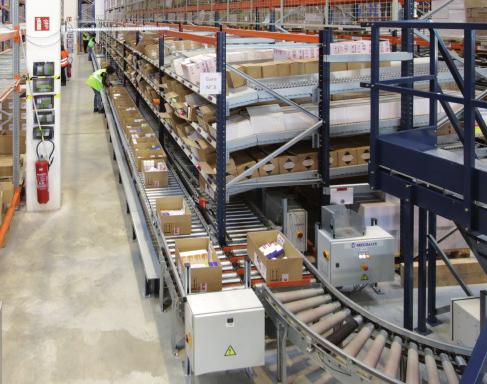 The solution consisted of carton flow racking with the pick-to-light system and a conveyor circuit with rollers that joined the prep zone to the sorting and consolidation areas.