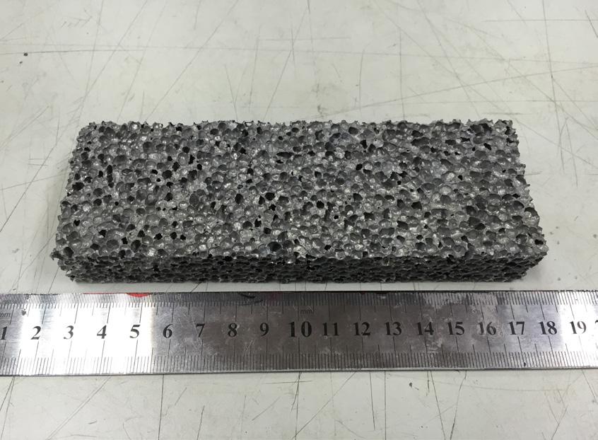 Aluminium Foam Sandwich Panel with Hybrid FRP test. The carbon and glass prepregs were stacked together and placed in the hot press machine for the curing process.