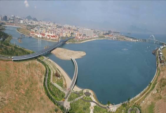 undertaken in Wuyuanwan, Xiamen, Fujian Province covered opening of coastal dam, dredging of inner bay, coastal