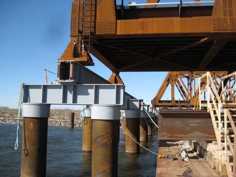 The jacking towers used for float in (comprised of heavy W36 s framing) were used to support (2) W36x302 lifting beams in direct contact with the lifted truss (see Figure 10 and Figure 11).