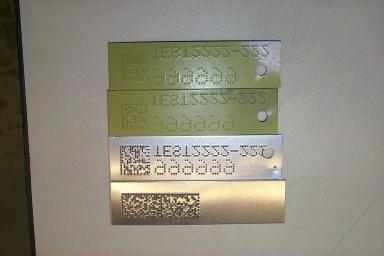 Dot-Peen Marking Structural Parts Example part identification tags with dot-peen marks.