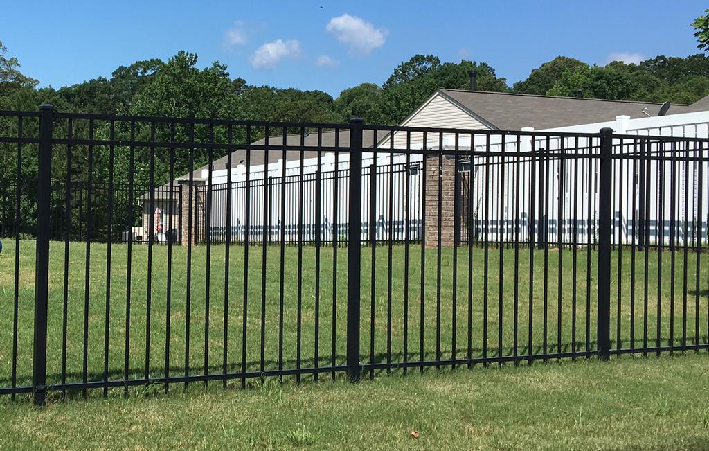 APPENDIX Fencing Styles (continued) Black Powder Coated Aluminum Fence (This style fence is allowed in Creekshire Village and in Creekshire Estates) The photo above represents an acceptable style of