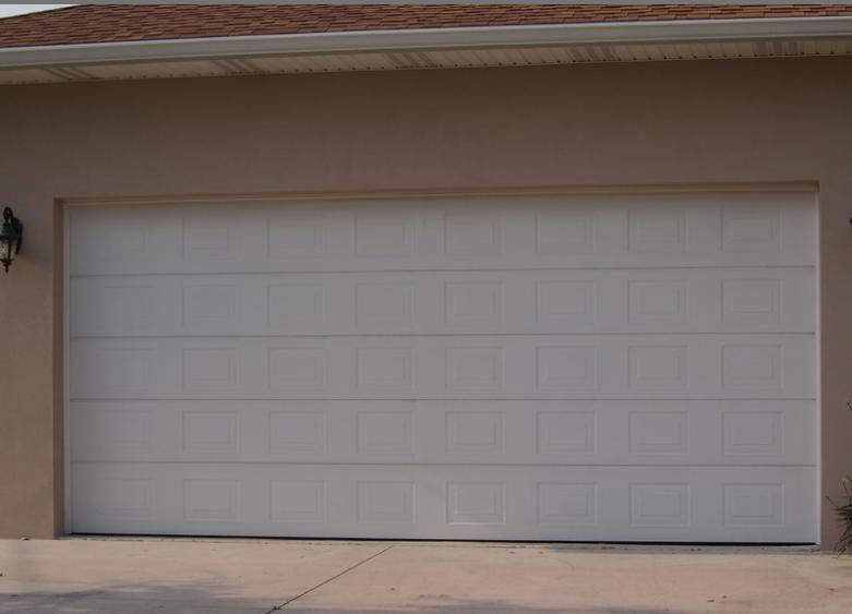 Section 9.36.2.7 of the BCBC requires garage vehicular doors to have an R Value of 6.245 or RSI 1.1 when conditioned.