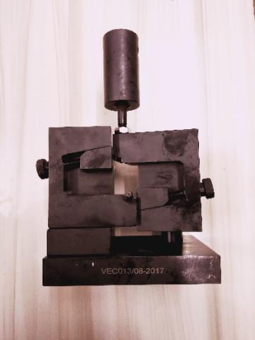 V Notch Shear (ASTM D5379) This test requires an Iosipescu shear fixture which is specifically designed for use with a Universal Testing Machine.