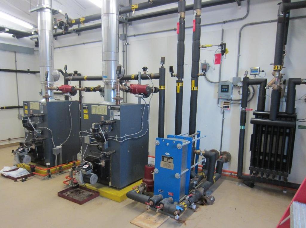 Space Heating Distribution Systems Figure 3: Heating plants in Kwigillingok Water Treatment Plant Space heating is provided by a hydronic loop.