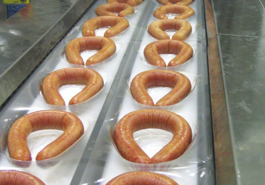 The art of co-extrusion technology With our co-extrusion technology you do not use preformed casings for the production of sausages. The casing is created at the same time as the sausage is produced.