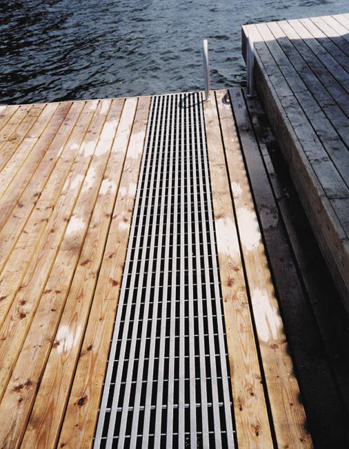 Manhole covers on Boston s historic Longfellow Bridge use DURAGRID T-5800 grating bonded to SUFPLATE gritted plate for a