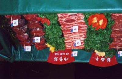 A USMEF poster placed at a retail outlet shows U.S. beef cuts for hot pot use, and a display at a USMEF beef seminar held in Chengdu exemplifies USMEF efforts to increase this market.