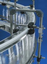 Over the years, the low conveyor beam height and small radius bends have