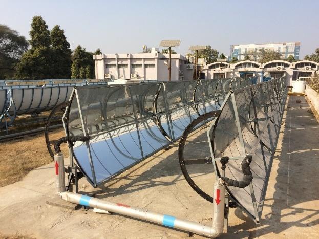 Fig.1 Parabolic troughs used for solar cooling Another system that we were shown, for comfort cooling of small offices consisted of compound parabolic concentrators (CPC), water cooled zeolite-water