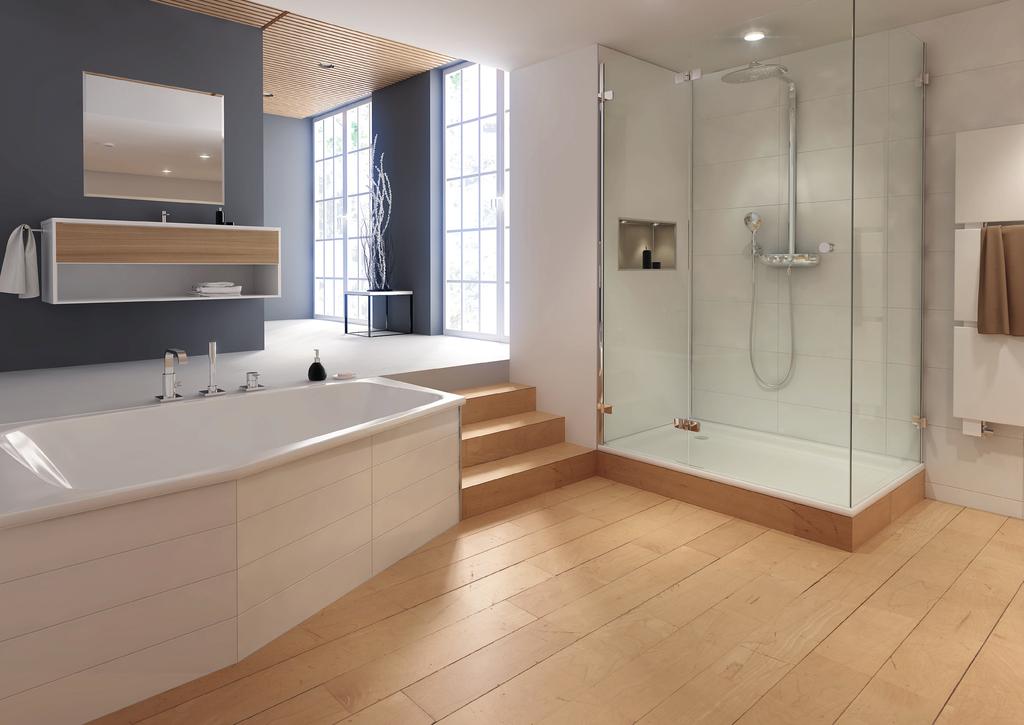 THE MADE-TO-MEASURE SUIT FOR TUBS AND SHOWER TRAYS The generous, asymmetrical double bathtub