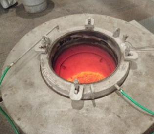 Prior to briquetting, the test material was heated up in an electrical furnace with nitrogen blanketing up to the desired testing temperature.