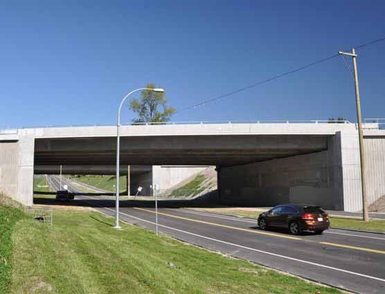 Multi-jurisdictional design standards were in place, with a four-lane bridge crossing the Trans-Canada Highway and two four-lane municipal bridges crossing over environmentally sensitive waterways,