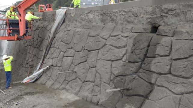 Shotcrete face was then stained to