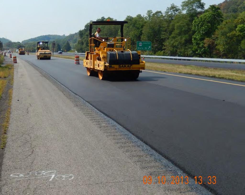 Rollers Follow Paver Closely