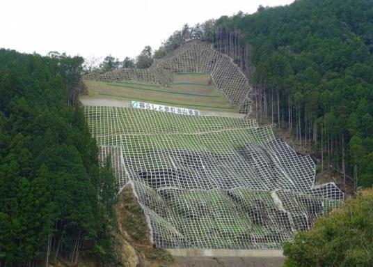 techniques introduced by JICA experts Image: Stabilization of Image: Completed hillside unstable natural slope crib work Unit net Round-shaped