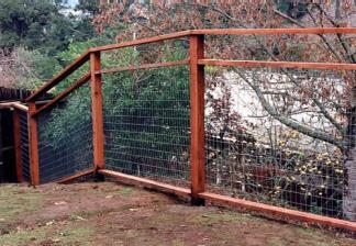 FENCE: GAME FENCE A structure serving as an enclosure, a barrier, or a boundary,