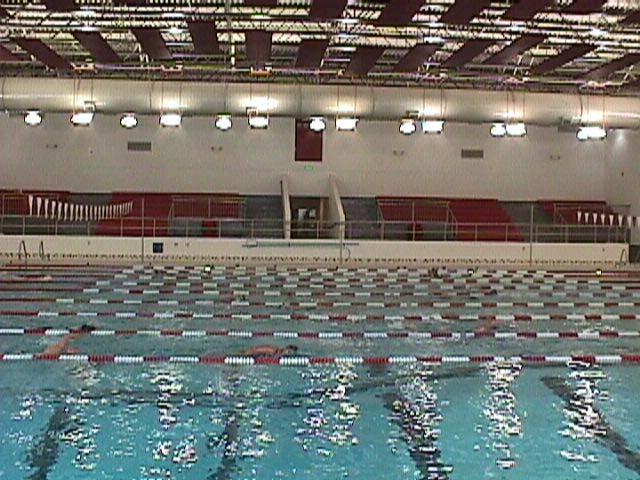Due to the humid atmosphere in natatoriums, bleacher manufacturers would not warranty the bleachers in the natatorium because the mechanical system of the telescoping bleachers would corrode within 5