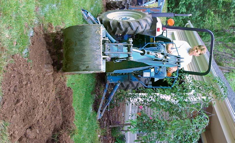 A machine makes digging easy. For bigger projects it may be worth renting a machine or hiring an excavator. Use the excavated dirt to raise the surrounding grade, or have a disposal spot in mind.