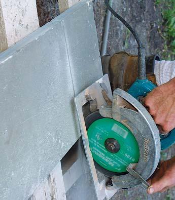 It is also important that the entire bottom of the stone is touching the base to prevent rocking and cracking. Begin at the house, and work your way toward the driveway.