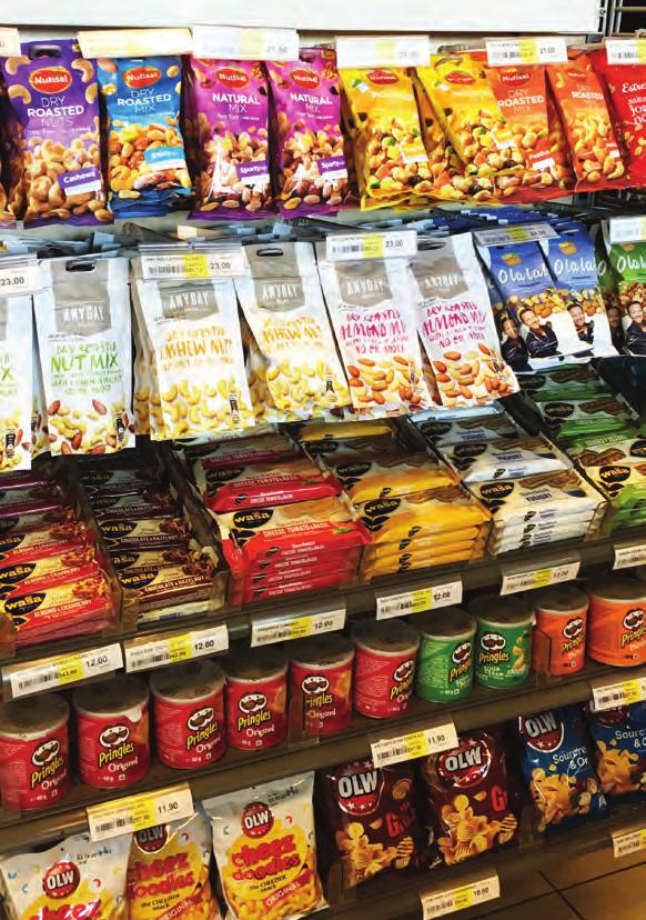 Use in-aisle and endcap displays to promote healthier options, keeping similar categories together.