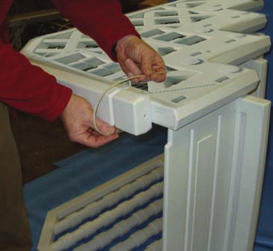 with the side panel. Repeat this procedure for each of the additional seven openings on this side of the step.